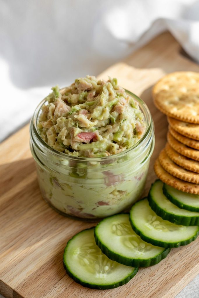 a photograph of a small glass jar filled 0dqKZpmgQfSeeXGki8lcEg V2jvh8xeSyyXgYudnqv9Uw