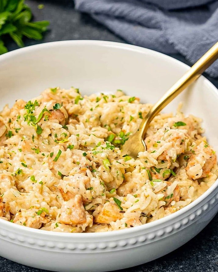 Creamy White Cheddar Garlic Butter Chicken Rice Skillet